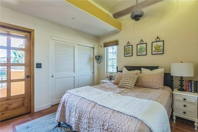 3606 W Chandler Blvd, Burbank, CA 91505 - tiled bedroom featuring a closet and beamed ceiling