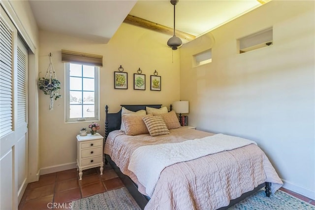 3606 W Chandler Blvd, Burbank, CA 91505 - tiled bedroom featuring a closet and beam ceiling