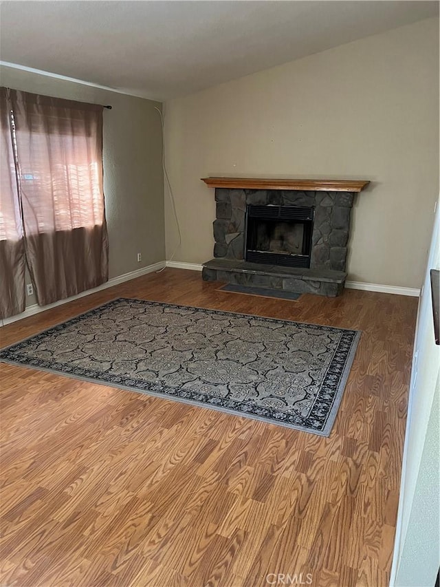 10178 Olivine Rd, Victorville, CA 92392 - living area with a fireplace and wood finished floors