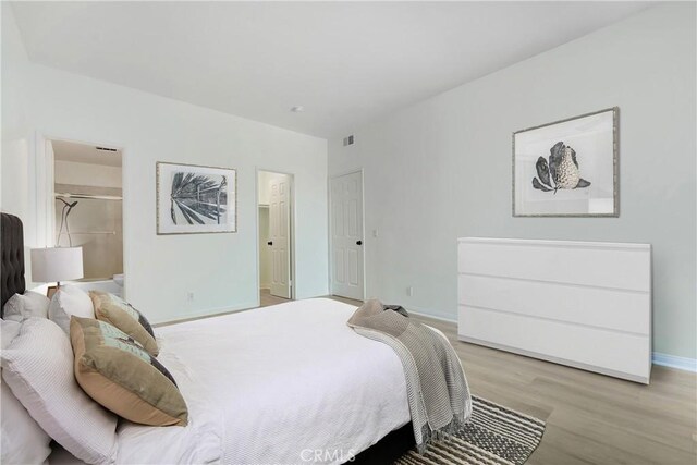 10861 Moorpark St Unit 203, North Hollywood, CA 91602 - bedroom featuring light wood-style flooring and baseboards