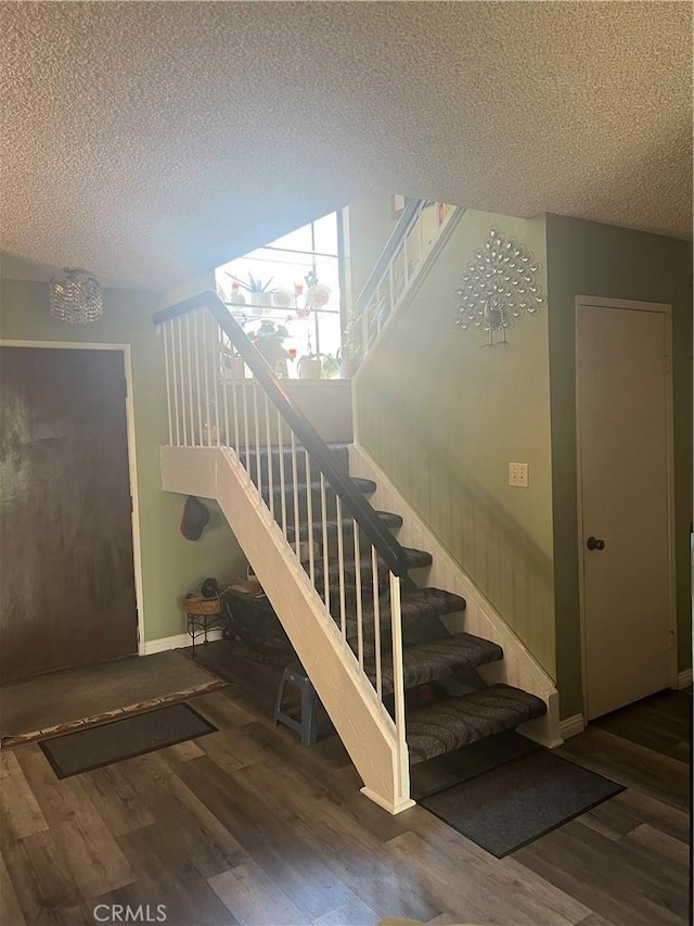 1522 Lahaina St, West Covina, CA 91792 - stairs with wood finished floors and a textured ceiling