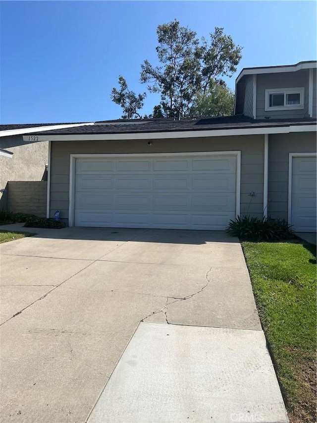 1522 Lahaina St, West Covina, CA 91792 - garage featuring concrete driveway