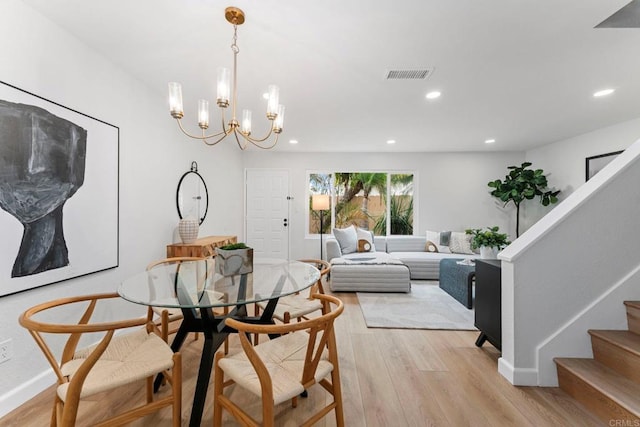 4532 Dawson Ave, San Diego, CA 92115 - dining space with light wood-type flooring, recessed lighting, stairway, and a chandelier