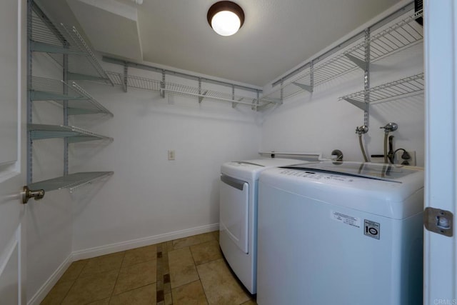 1651 S Juniper St Unit 172, Escondido, CA 92025 - washroom with independent washer and dryer and light tile patterned floors