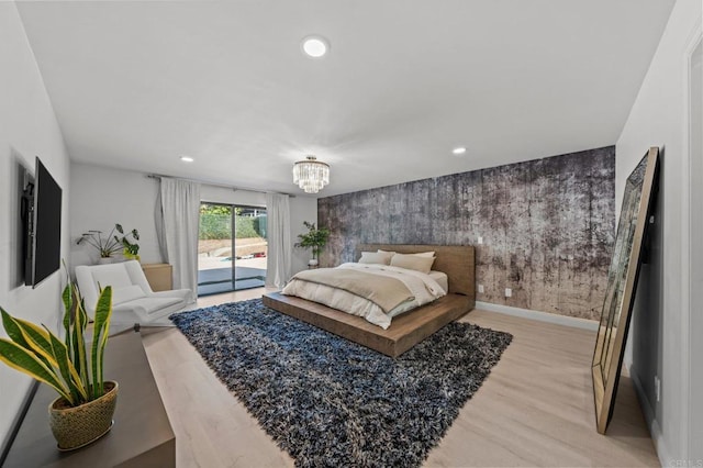 20 Lake Helix Dr, La Mesa, CA 91941 - bedroom with access to outside, light wood-type flooring, recessed lighting, a chandelier, and an accent wall