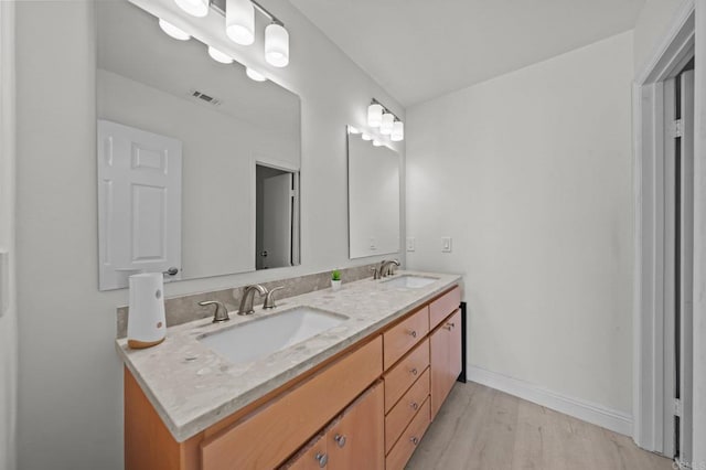 20 Lake Helix Dr, La Mesa, CA 91941 - bathroom featuring double vanity and wood finished floors