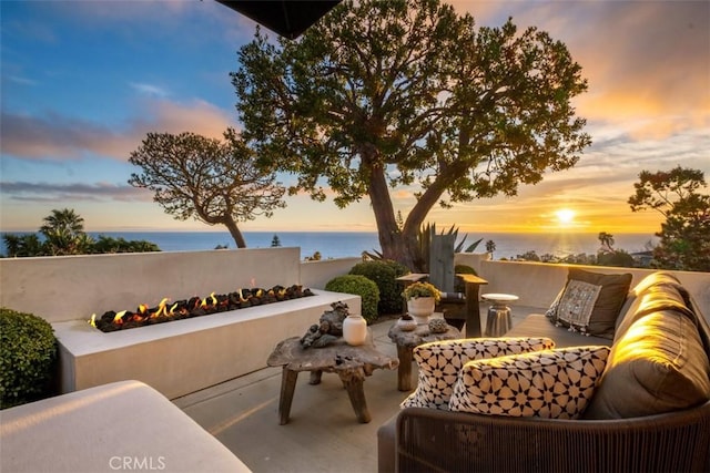 21611 Ocean Vista Dr, Laguna Beach, CA 92651 - view of patio / terrace with a water view and an outdoor living space with a fire pit