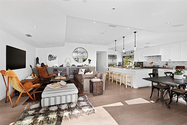 21611 Ocean Vista Dr, Laguna Beach, CA 92651 - living area with light wood-style floors and recessed lighting