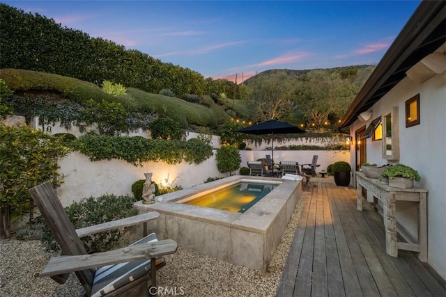 21611 Ocean Vista Dr, Laguna Beach, CA 92651 - wooden terrace with an in-ground hot tub and a fenced backyard