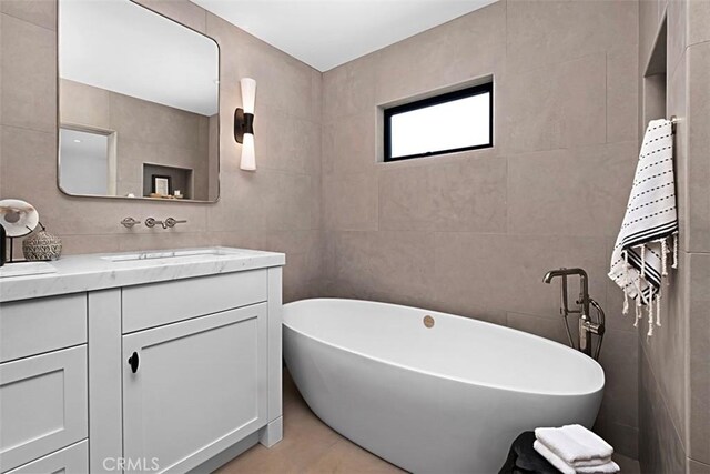 21611 Ocean Vista Dr, Laguna Beach, CA 92651 - full bath with tile walls, vanity, and a soaking tub