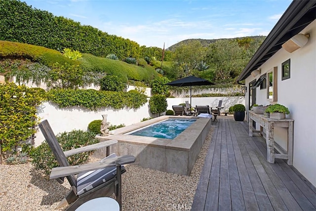 21611 Ocean Vista Dr, Laguna Beach, CA 92651 - view of swimming pool with an outdoor hot tub, a deck, and a fenced backyard
