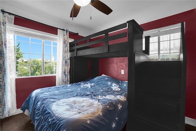 6059 Riverside Ave, Huntington Park, CA 90255 - bedroom with wood finished floors and a ceiling fan
