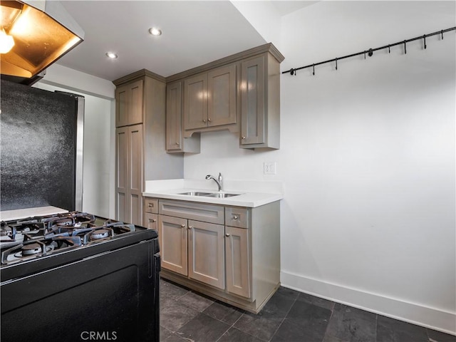 117 N Toluca St, Los Angeles, CA 90026 - kitchen featuring black range with gas cooktop, light countertops, range hood, and recessed lighting
