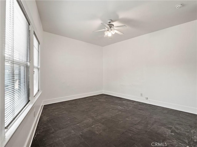 117 N Toluca St, Los Angeles, CA 90026 - empty room with a smoke detector and ceiling fan