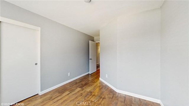 9020 Newport Ave Unit 17, Fontana, CA 92335 - empty room featuring baseboards and wood finished floors