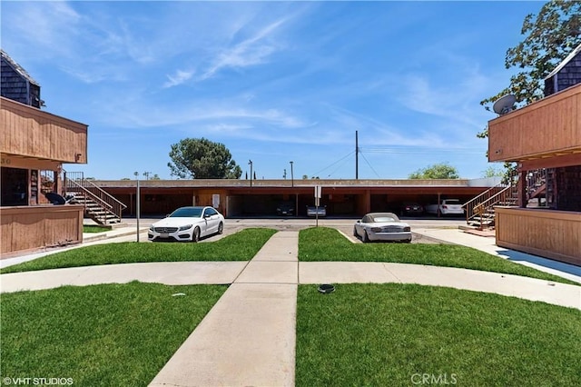 9020 Newport Ave Unit 17, Fontana, CA 92335 - view of green lawn with stairs
