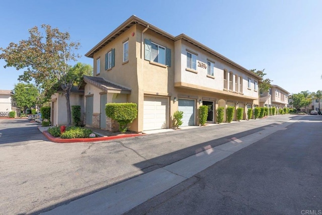 26396 Arboretum Way Unit 2908, Murrieta, CA 92563 - view of asphalt road featuring a residential view