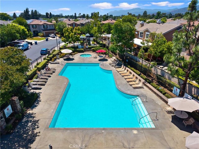 154 Fernpine Ln, Pomona, CA 91767 - community pool with a community hot tub and a residential view