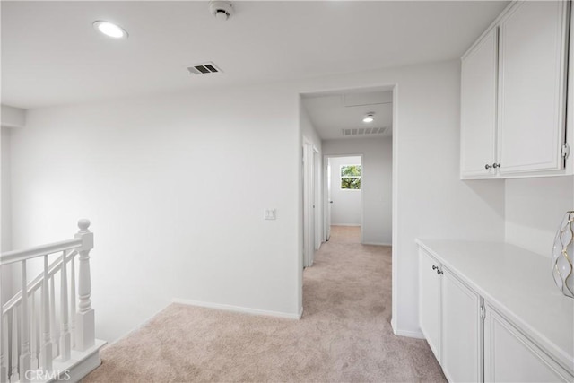 154 Fernpine Ln, Pomona, CA 91767 - corridor with an upstairs landing, light colored carpet, and recessed lighting