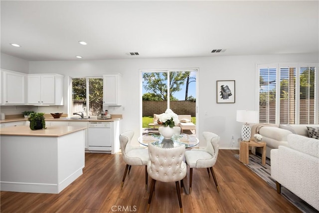 154 Fernpine Ln, Pomona, CA 91767 - dining space featuring dark wood finished floors and recessed lighting