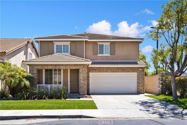 154 Fernpine Ln, Pomona, CA 91767 - traditional home with covered porch, an attached garage, and concrete driveway