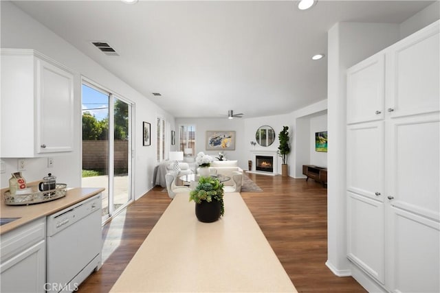 154 Fernpine Ln, Pomona, CA 91767 - dining room with a warm lit fireplace, recessed lighting, dark wood finished floors, and ceiling fan