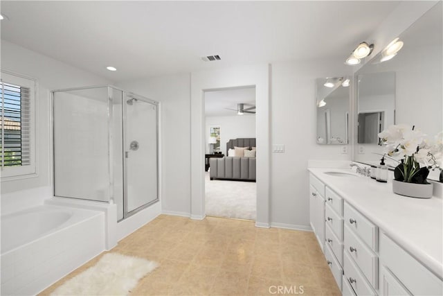 154 Fernpine Ln, Pomona, CA 91767 - bathroom with healthy amount of natural light, vanity, a stall shower, ensuite bathroom, and recessed lighting
