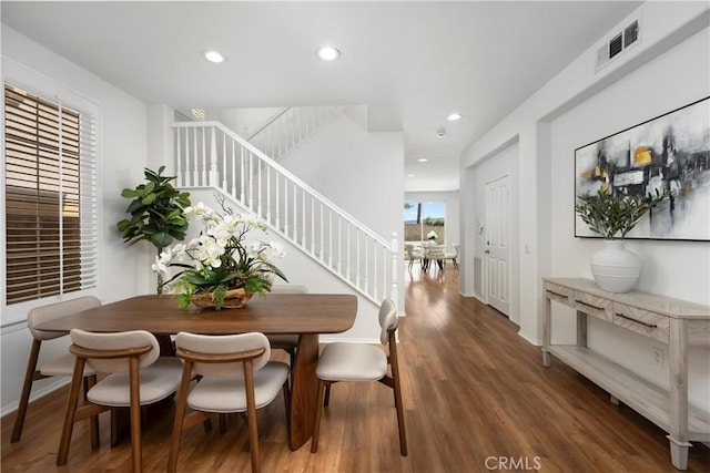 154 Fernpine Ln, Pomona, CA 91767 - dining space featuring stairs, wood finished floors, and recessed lighting