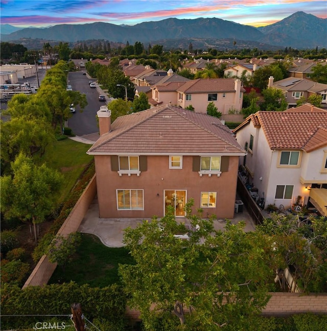 154 Fernpine Ln, Pomona, CA 91767 - aerial view at dusk of a mountain view and a residential view