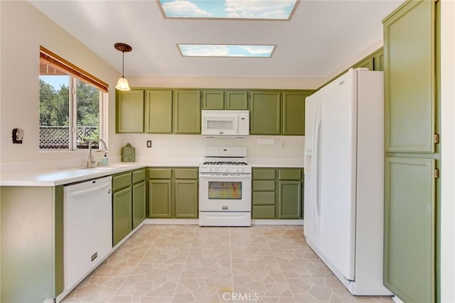 30747 Loma Linda Rd, Temecula, CA 92592 - kitchen with green cabinetry, white appliances, light countertops, and pendant lighting