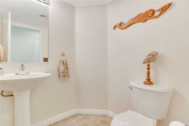 30747 Loma Linda Rd, Temecula, CA 92592 - bathroom featuring toilet and baseboards