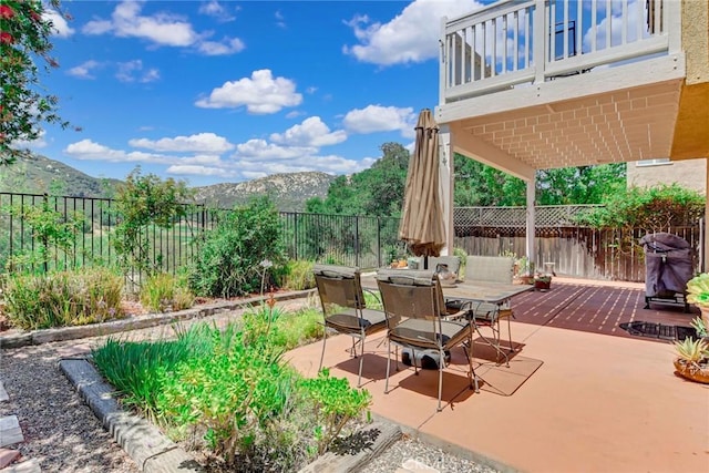 30747 Loma Linda Rd, Temecula, CA 92592 - fenced backyard with outdoor dining area, a deck with mountain view, a grill, and a patio area