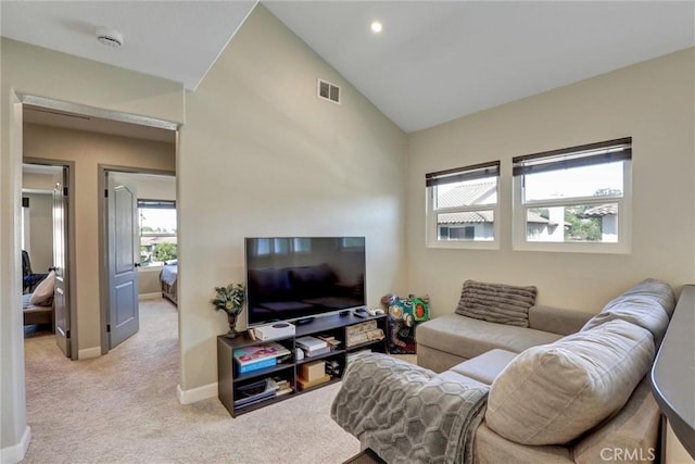 2000 San Antonio Dr, Corona, Corona, CA 92882 - carpeted living area with vaulted ceiling and baseboards