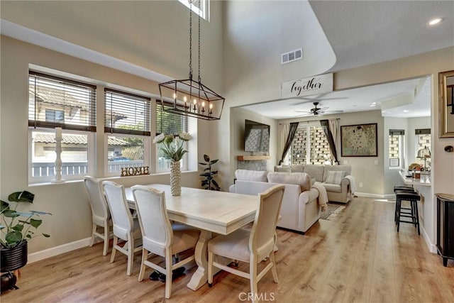 2000 San Antonio Dr, Corona, Corona, CA 92882 - dining room with a ceiling fan, light wood-style flooring, recessed lighting, and a chandelier