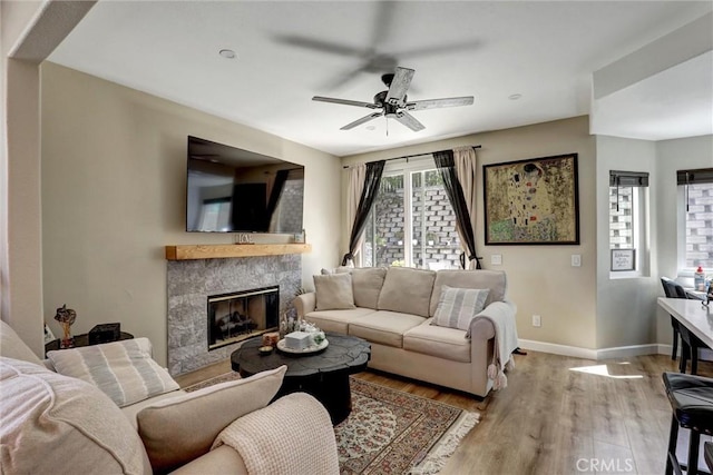 2000 San Antonio Dr, Corona, Corona, CA 92882 - living area featuring wood finished floors, a fireplace, and ceiling fan
