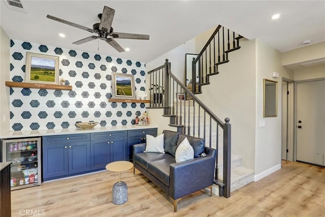 2000 San Antonio Dr, Corona, Corona, CA 92882 - living area featuring beverage cooler, stairway, light wood-style flooring, a ceiling fan, and recessed lighting