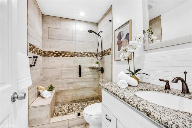 33554 Halyard Dr, Dana Point, CA 92629 - bathroom with vanity, a shower stall, decorative backsplash, and recessed lighting