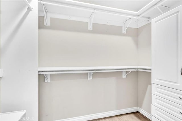 33554 Halyard Dr, Dana Point, CA 92629 - walk in closet with wood finished floors