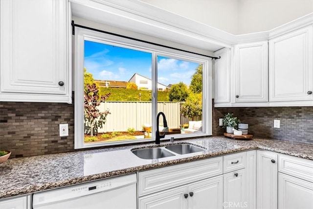 33554 Halyard Dr, Dana Point, CA 92629 - kitchen with white dishwasher, decorative backsplash, and white cabinetry