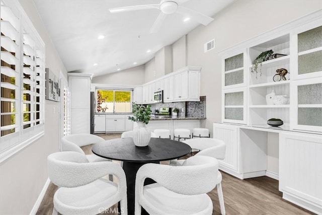 33554 Halyard Dr, Dana Point, CA 92629 - dining space featuring light wood-style floors, a ceiling fan, recessed lighting, and high vaulted ceiling