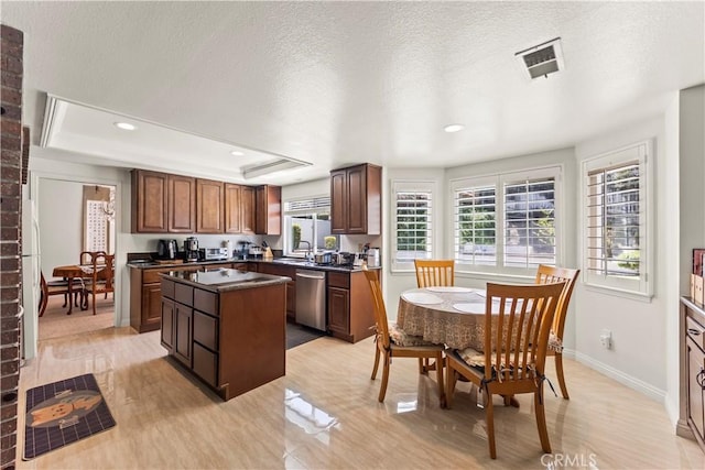 1825 Calle Madrid, Rowland Heights, CA 91748 - kitchen with dishwasher, a kitchen island, dark countertops, a raised ceiling, and light wood-style floors