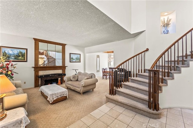 1825 Calle Madrid, Rowland Heights, CA 91748 - living room with stairway, light colored carpet, a chandelier, light tile patterned flooring, and healthy amount of natural light