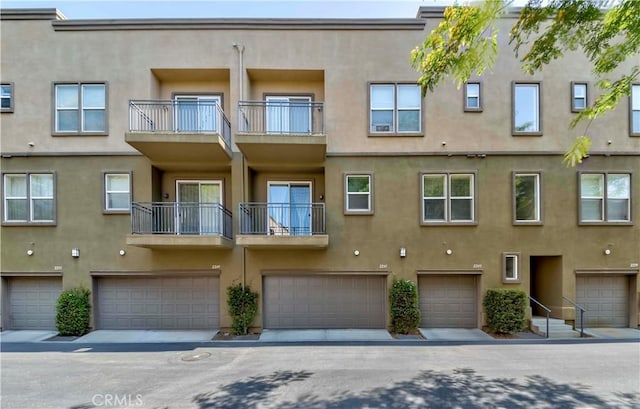 2245 Chaffee St, Fullerton, CA 92833 - view of apartment building / complex with a garage