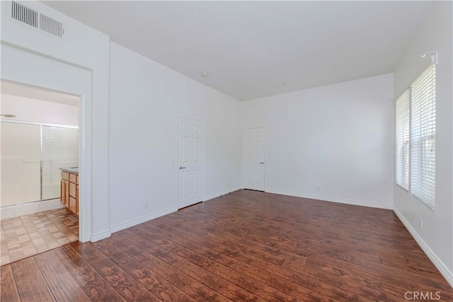 2245 Chaffee St, Fullerton, CA 92833 - unfurnished room with dark wood-style floors and baseboards