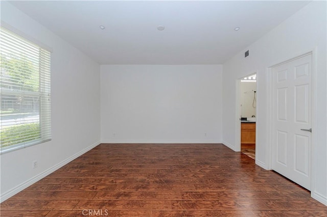 2245 Chaffee St, Fullerton, CA 92833 - unfurnished room with dark wood-style flooring and baseboards