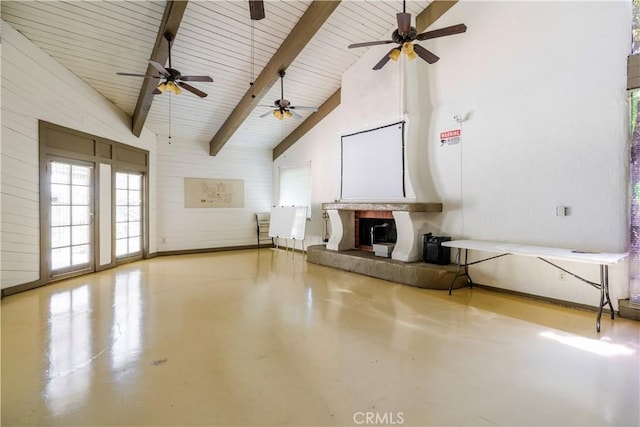 1620 Neil Armstrong St Unit 306, Montebello, CA 90640 - unfurnished living room featuring a fireplace with raised hearth, ceiling fan, finished concrete flooring, a wooden ceiling with exposed beams, and high vaulted ceiling