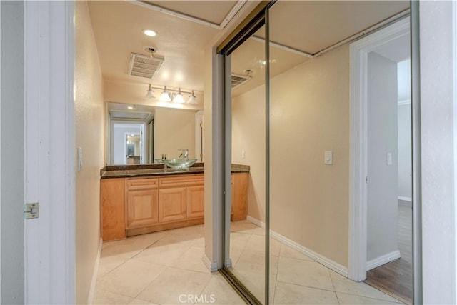 1620 Neil Armstrong St Unit 306, Montebello, CA 90640 - bathroom featuring vanity and tile patterned flooring