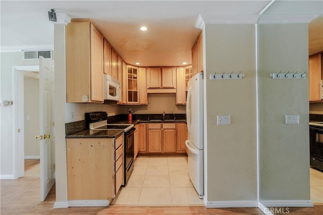 1620 Neil Armstrong St Unit 306, Montebello, CA 90640 - kitchen with white appliances, glass insert cabinets, recessed lighting, and light brown cabinets