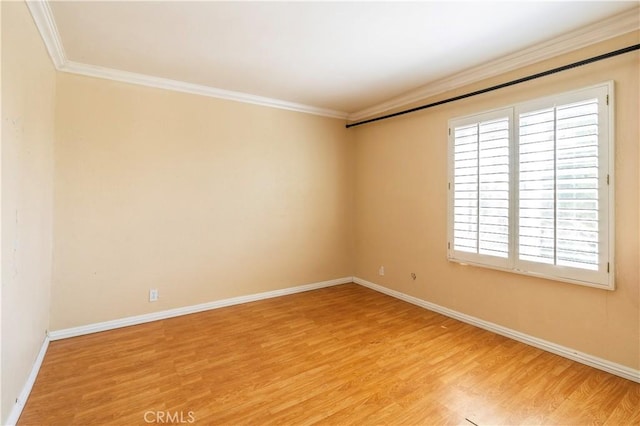 1620 Neil Armstrong St Unit 306, Montebello, CA 90640 - unfurnished room featuring light wood-style flooring and ornamental molding