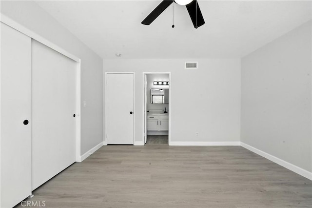 10655 Springfield Dr, Rancho Cucamonga, CA 91730 - unfurnished bedroom featuring light wood finished floors, ensuite bathroom, a closet, and ceiling fan
